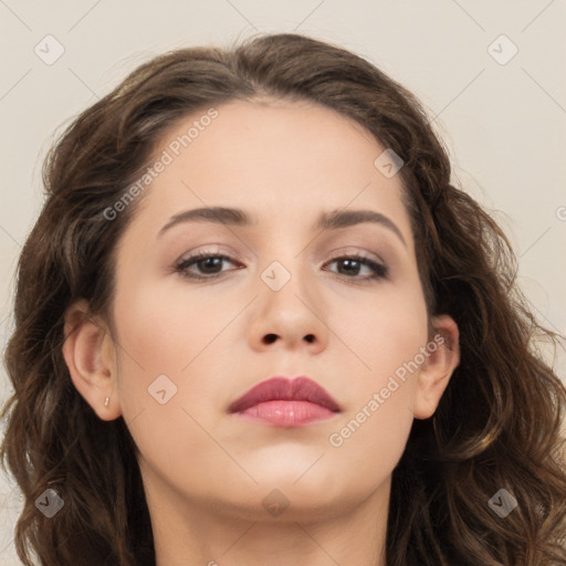 Neutral white young-adult female with long  brown hair and brown eyes