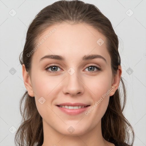 Joyful white young-adult female with long  brown hair and grey eyes