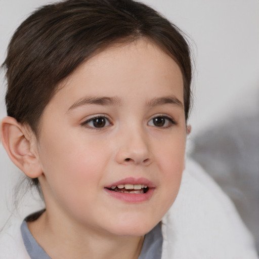 Joyful white child female with medium  brown hair and brown eyes