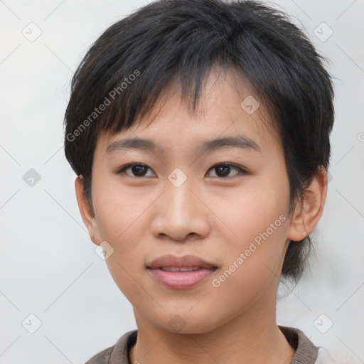 Joyful asian young-adult female with short  brown hair and brown eyes