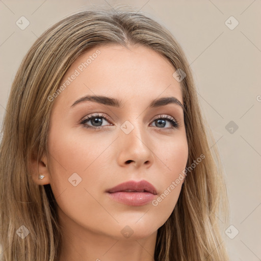 Neutral white young-adult female with long  brown hair and brown eyes