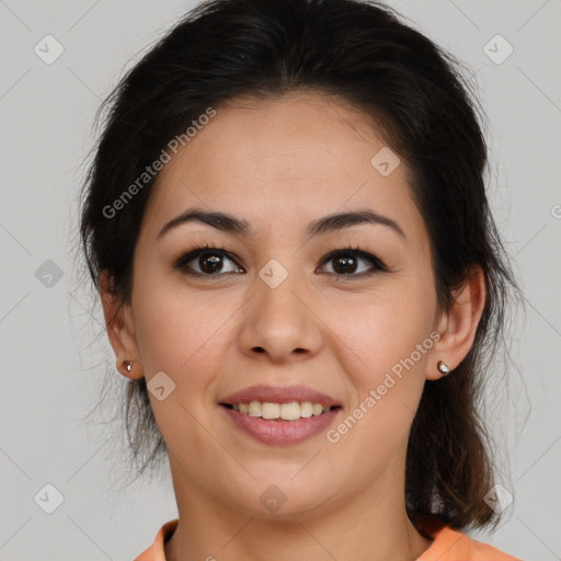 Joyful latino young-adult female with medium  brown hair and brown eyes