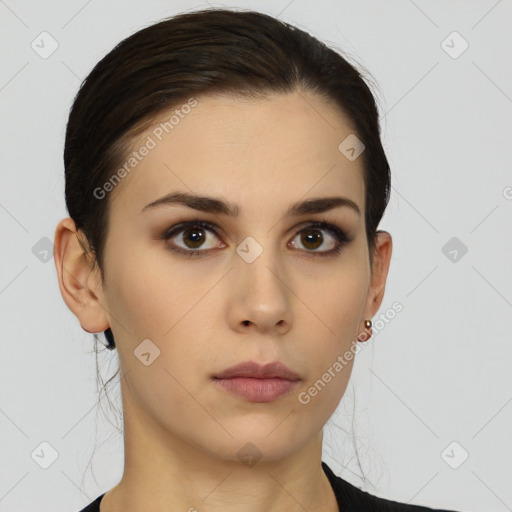 Neutral white young-adult female with short  brown hair and brown eyes