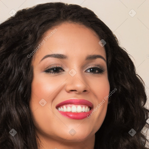 Joyful latino young-adult female with long  black hair and brown eyes