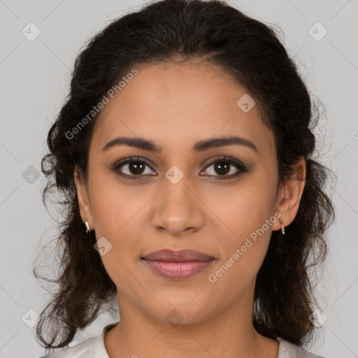 Joyful latino young-adult female with medium  brown hair and brown eyes