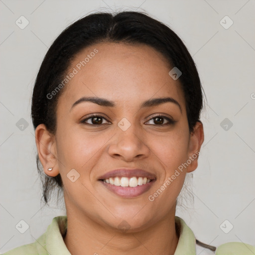 Joyful latino young-adult female with medium  brown hair and brown eyes