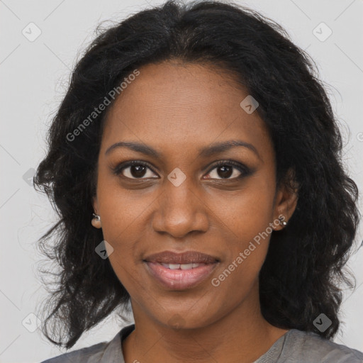 Joyful black young-adult female with long  brown hair and brown eyes