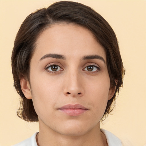 Neutral white young-adult female with medium  brown hair and brown eyes