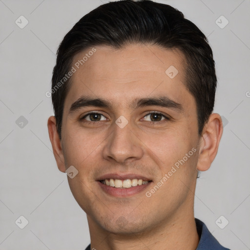 Joyful white young-adult male with short  brown hair and brown eyes