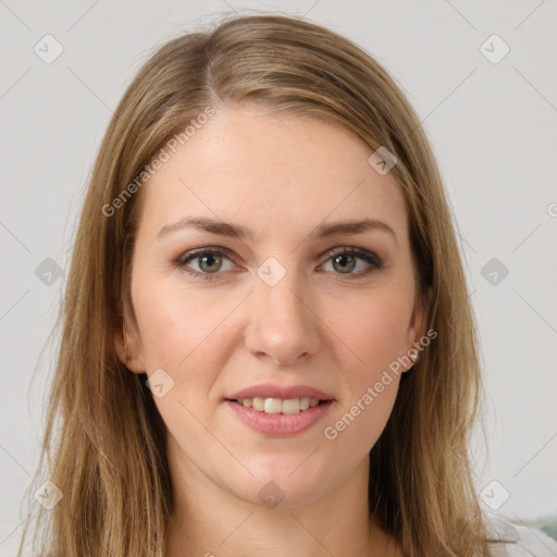 Joyful white young-adult female with long  brown hair and green eyes