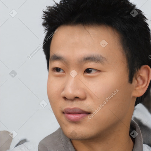 Neutral asian young-adult male with short  black hair and brown eyes