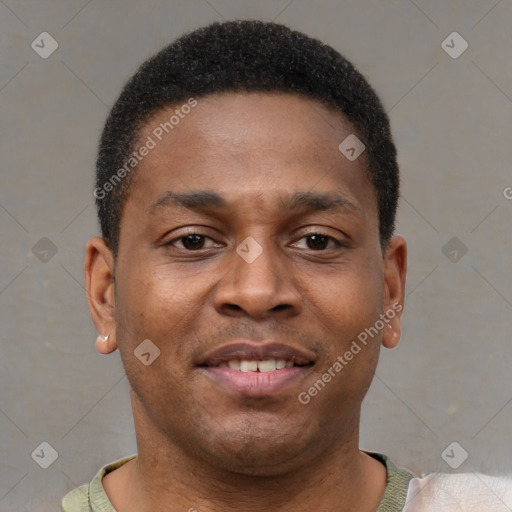 Joyful latino young-adult male with short  brown hair and brown eyes