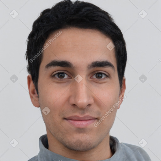 Joyful white young-adult male with short  black hair and brown eyes