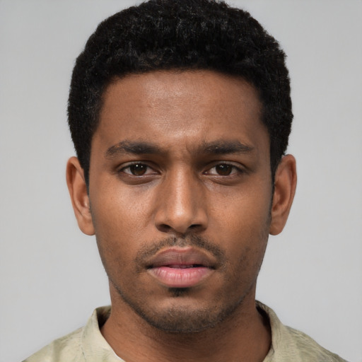 Neutral black young-adult male with short  black hair and brown eyes