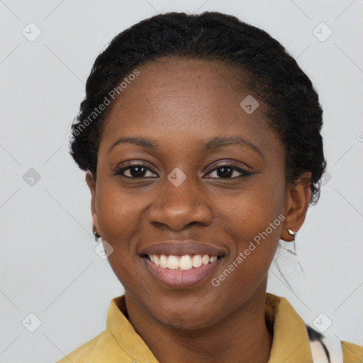 Joyful latino young-adult female with short  black hair and brown eyes