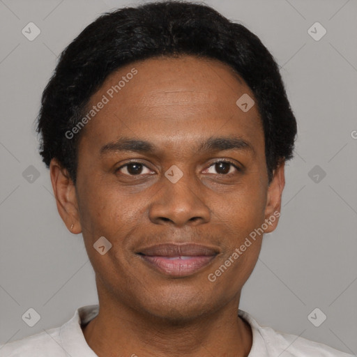 Joyful black young-adult male with short  black hair and brown eyes