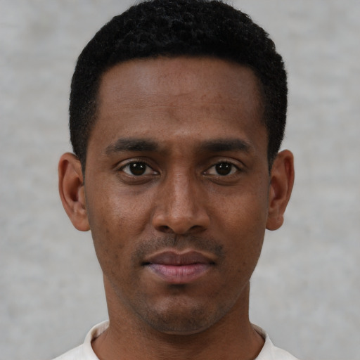 Neutral black young-adult male with short  black hair and brown eyes