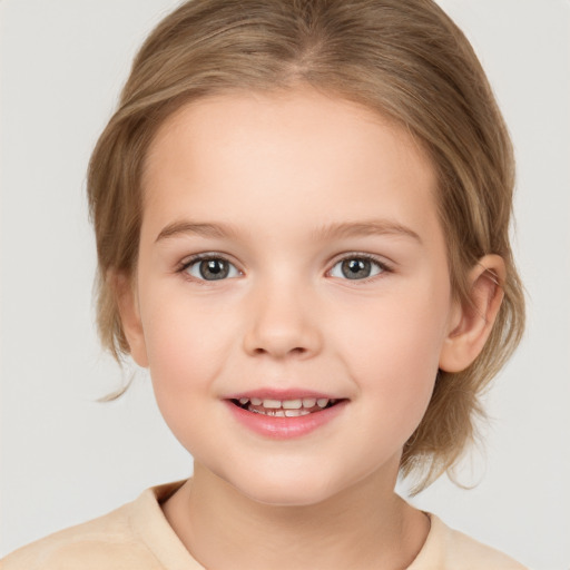 Joyful white child female with medium  brown hair and brown eyes