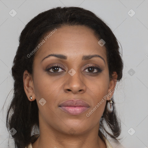 Joyful black young-adult female with long  brown hair and brown eyes