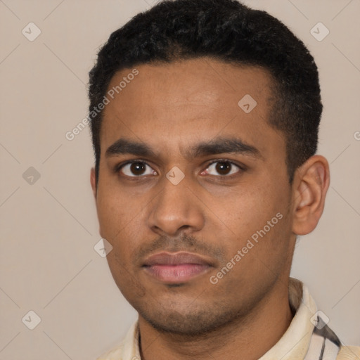 Neutral latino young-adult male with short  black hair and brown eyes
