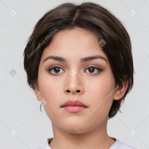 Neutral white young-adult female with medium  brown hair and brown eyes