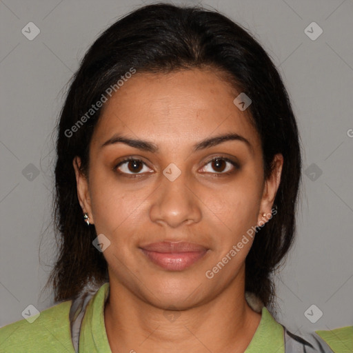 Joyful black young-adult female with medium  brown hair and brown eyes