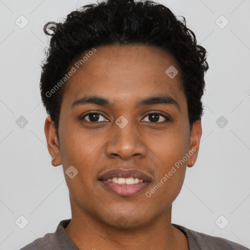 Joyful black young-adult male with short  black hair and brown eyes