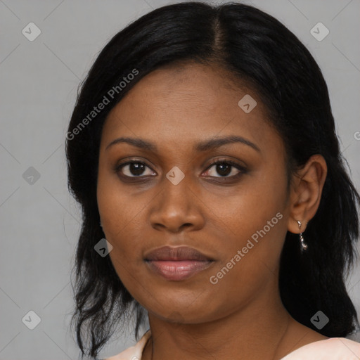 Joyful black young-adult female with medium  black hair and brown eyes
