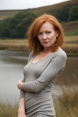 Belgian middle-aged female with  ginger hair