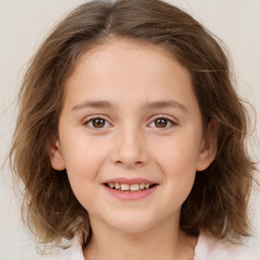 Joyful white child female with medium  brown hair and brown eyes