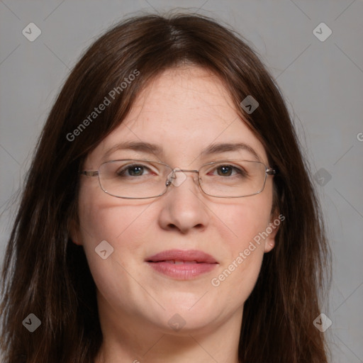 Joyful white adult female with long  brown hair and grey eyes