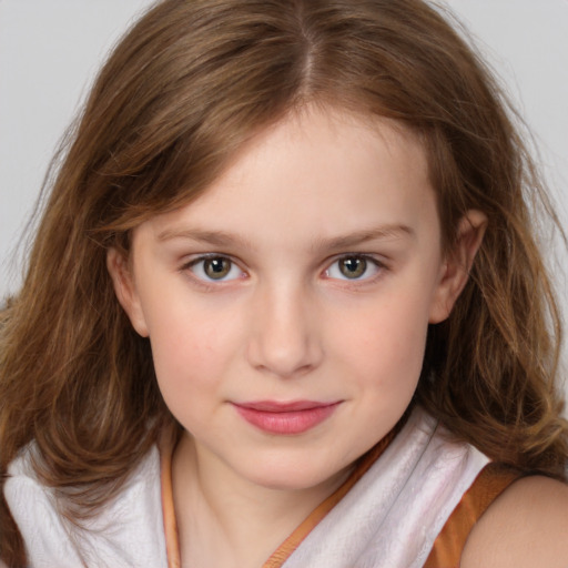 Joyful white child female with medium  brown hair and brown eyes