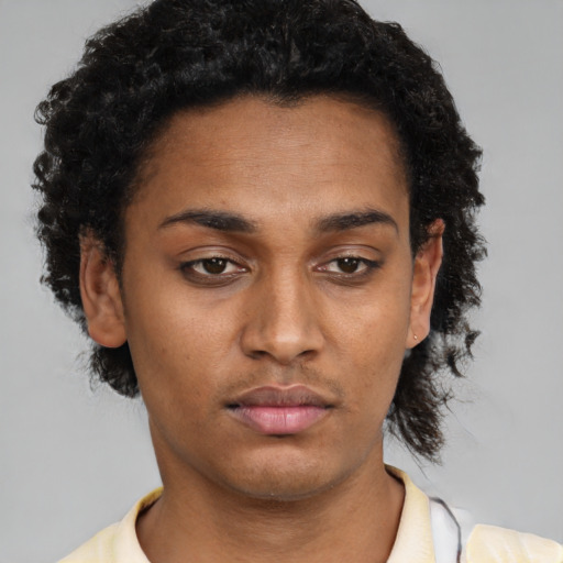 Neutral black young-adult female with short  brown hair and brown eyes