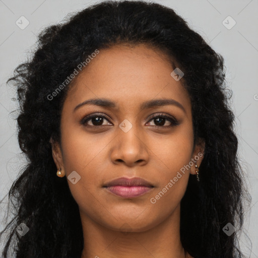 Joyful black young-adult female with long  brown hair and brown eyes