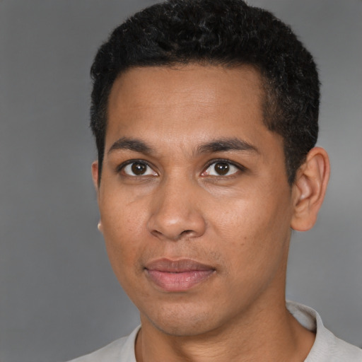 Neutral black young-adult male with short  black hair and brown eyes
