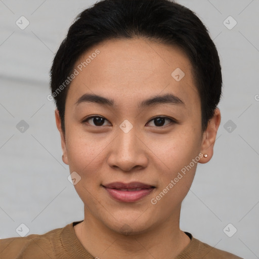 Joyful asian young-adult female with short  brown hair and brown eyes