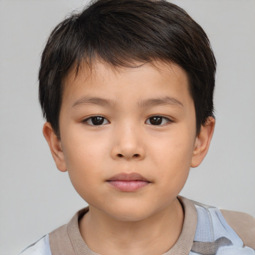 Neutral asian child male with short  brown hair and brown eyes