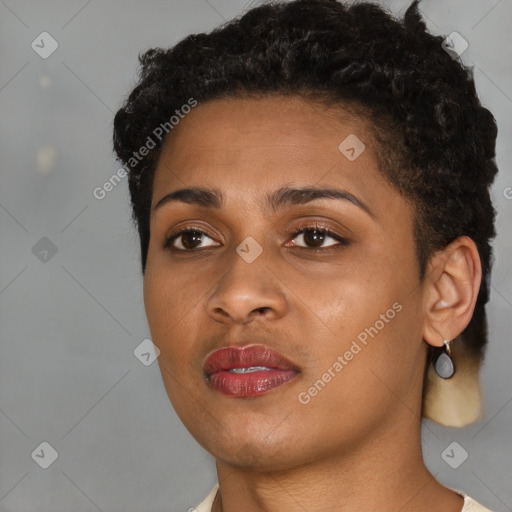 Joyful black young-adult female with short  brown hair and brown eyes