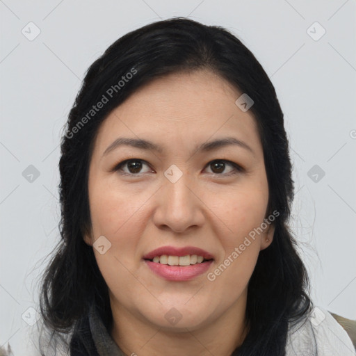 Joyful asian adult female with medium  brown hair and brown eyes