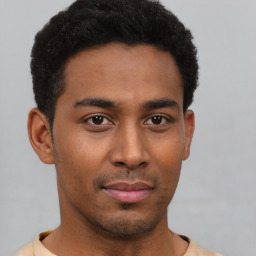 Neutral black young-adult male with short  brown hair and brown eyes