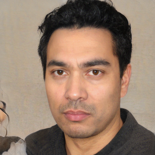 Neutral white young-adult male with short  black hair and brown eyes