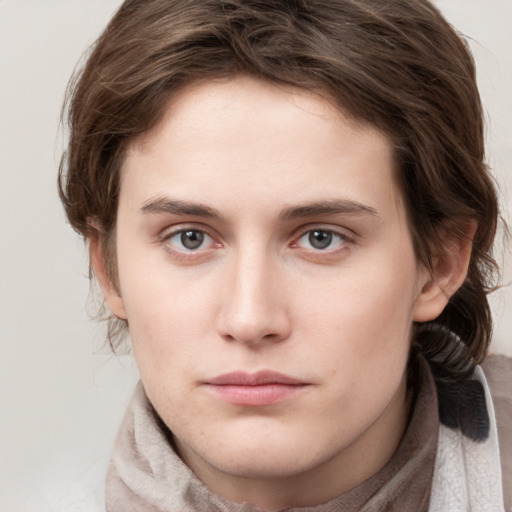 Neutral white young-adult female with medium  brown hair and grey eyes