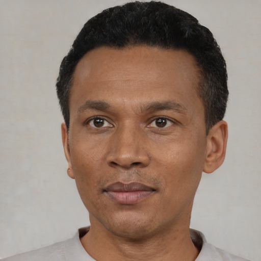 Neutral black adult male with short  black hair and brown eyes
