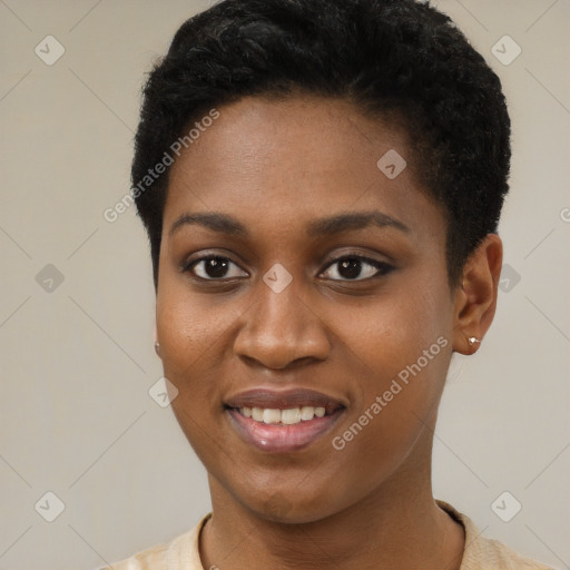 Joyful black young-adult female with short  black hair and brown eyes