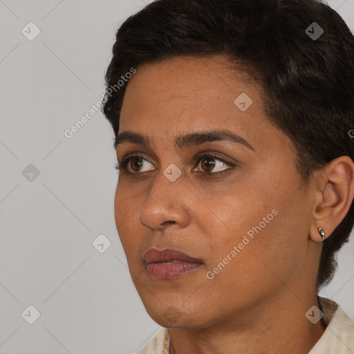 Neutral black young-adult female with short  brown hair and brown eyes