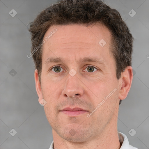 Neutral white adult male with short  brown hair and brown eyes