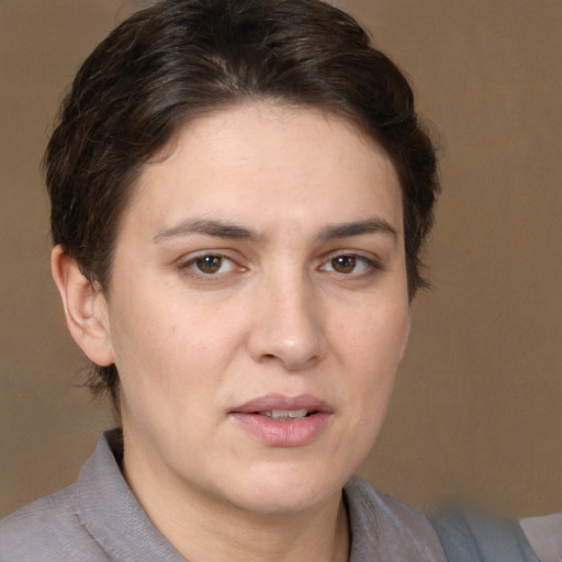 Joyful white young-adult female with medium  brown hair and brown eyes