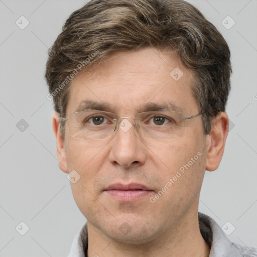 Joyful white adult male with short  brown hair and grey eyes