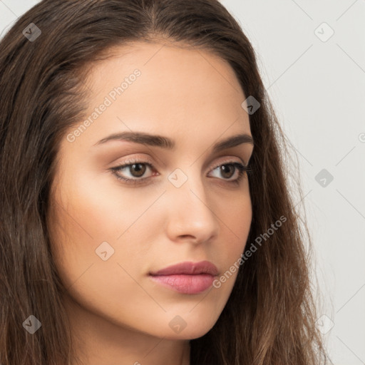 Neutral white young-adult female with long  brown hair and brown eyes