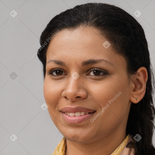 Joyful latino young-adult female with long  brown hair and brown eyes